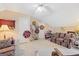 Cozy living room with floral sofa, complemented by neutral walls and decor at 20 Knollwood Pl, Covington, GA 30014