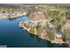Breathtaking aerial view of stunning lakefront properties with docks, surrounded by nature at 1190 Plantation Dr, Villa Rica, GA 30180