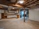 Spacious unfinished basement with wood beams and potential for customization at 1190 Plantation Dr, Villa Rica, GA 30180