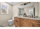 Beautiful bathroom with a double vanity, granite countertops, and updated fixtures at 1190 Plantation Dr, Villa Rica, GA 30180