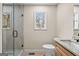 Well-lit bathroom featuring a glass shower and a granite countertop vanity at 1190 Plantation Dr, Villa Rica, GA 30180
