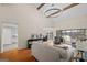 Spacious living room with hardwood floors, fireplace, and lake views from the windows at 1190 Plantation Dr, Villa Rica, GA 30180
