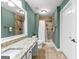 Bathroom with granite countertops and tiled shower at 275 Rehobeth Way, Fayetteville, GA 30214