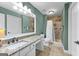 Bathroom with a granite countertop and tiled shower at 275 Rehobeth Way, Fayetteville, GA 30214
