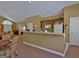 Clubhouse kitchen with counter seating, modern appliances, and ample cabinet space for community events at 275 Rehobeth Way, Fayetteville, GA 30214