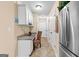 A bright hallway offers a built-in desk, neutral walls, and tile flooring at 275 Rehobeth Way, Fayetteville, GA 30214
