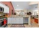 This kitchen features stainless steel appliances, tile backsplash, and granite countertops at 275 Rehobeth Way, Fayetteville, GA 30214