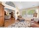 Bright sunroom with lots of windows and comfortable furnishings at 275 Rehobeth Way, Fayetteville, GA 30214