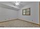 Bedroom features neutral walls, carpet floors, and a window at 390 Stoneridge Way, Fayetteville, GA 30215