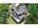 Back aerial view of a home featuring a rear deck at 390 Stoneridge Way, Fayetteville, GA 30215