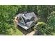 Back aerial view of a home featuring a rear deck at 390 Stoneridge Way, Fayetteville, GA 30215