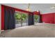 Bright living room with sliding glass doors to the deck and lots of natural light at 390 Stoneridge Way, Fayetteville, GA 30215