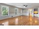 Bright living room with hardwood floors and views of the backyard and bar at 829 Bev Ct, Lawrenceville, GA 30046