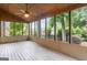 Spacious screened-in porch with views of the private backyard landscaping at 829 Bev Ct, Lawrenceville, GA 30046