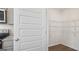 Walk-in pantry with wire shelving, offering ample storage space off of the kitchen at 8587 Secretariat Dr, Lithonia, GA 30058
