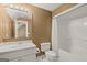 Bathroom featuring a toilet, tub-shower combination, and single sink vanity at 9125 Patrick Pl, Winston, GA 30187