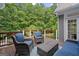 Outdoor deck with plenty of seating to enjoy the outdoors at 9125 Patrick Pl, Winston, GA 30187