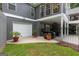 Home's exterior features a garage, lawn, and fenced-in porch at 9125 Patrick Pl, Winston, GA 30187