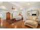 Spacious primary suite with hardwood flooring, a sitting area, and lots of natural light at 9125 Patrick Pl, Winston, GA 30187