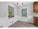 Bright breakfast nook featuring new flooring and natural light streaming through the windows at 260 Pinehurst Dr, Stockbridge, GA 30281