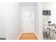 Bright entryway featuring a hardwood floor and decorative glass front door at 650 Lynhurst Sw Dr, Atlanta, GA 30311