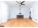 Spacious living room with hardwood floors, ceiling fan, and neutral walls at 650 Lynhurst Sw Dr, Atlanta, GA 30311