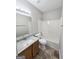 Clean bathroom with new vanity and shower-tub combo at 537 Goldfinch Way, Stockbridge, GA 30281