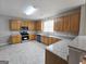 Spacious kitchen featuring stainless steel appliances, granite countertops, and ample cabinet space at 537 Goldfinch Way, Stockbridge, GA 30281