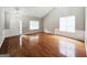 Bright and airy living room with hardwood floors, wainscoting, and vaulted ceiling at 537 Goldfinch Way, Stockbridge, GA 30281