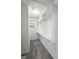 Walk-in closet with carpet and custom shelving for optimal organization and storage solutions at 537 Goldfinch Way, Stockbridge, GA 30281