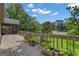 Well-maintained deck overlooking a lush backyard and golf course, perfect for outdoor enjoyment at 110 Tamerlane, Peachtree City, GA 30269