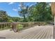 Spacious deck area providing an outdoor living space with scenic views of the landscaped backyard at 110 Tamerlane, Peachtree City, GA 30269