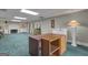Large basement space featuring a fireplace and built-in shelving at 110 Tamerlane, Peachtree City, GA 30269