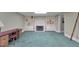 Finished basement with fireplace, cabinets, and plenty of space at 110 Tamerlane, Peachtree City, GA 30269