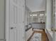 Bright bathroom featuring granite counters, double vanity, and glass shower door at 110 Tamerlane, Peachtree City, GA 30269