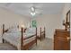 Charming bedroom with two beds, ceiling fan, and neutral decor at 110 Tamerlane, Peachtree City, GA 30269
