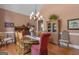Elegant dining room featuring a chandelier, and hardwood floors at 110 Tamerlane, Peachtree City, GA 30269