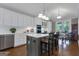 Bright, modern kitchen with a large island, stainless appliances, and lots of counter space at 110 Tamerlane, Peachtree City, GA 30269