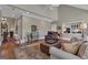 Comfortable living room showcasing hardwood floors, neutral tones, and bright light at 110 Tamerlane, Peachtree City, GA 30269