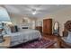 Serene main bedroom showcasing a fireplace, hardwood floors and ample storage at 110 Tamerlane, Peachtree City, GA 30269