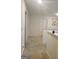 Hallway with carpeted floor and view of the upstairs at 160 Grafton St, Hampton, GA 30228