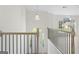 Bright and open foyer with modern lighting and a view to the home's exterior at 128 Southern Magnolia Ln, Rex, GA 30273