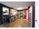 Large kitchen with wooden cabinets, stainless steel appliances, and an adjacent dining space at 860 Sweet Mill Ln, Lawrenceville, GA 30045