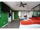 Spacious main bedroom featuring a trey ceiling, ceiling fan, mirrorred closet doors and ensuite bathroom access at 860 Sweet Mill Ln, Lawrenceville, GA 30045