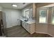 Well-lit kitchen with stainless steel appliances and sleek countertops at 60 Doe Run Dr, Sharpsburg, GA 30277