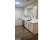 Clean kitchen featuring modern finishes and a view of the yard at 60 Doe Run Dr, Sharpsburg, GA 30277