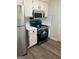 Kitchen with stainless appliances and modern finishes at 60 Doe Run Dr, Sharpsburg, GA 30277