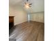 Inviting living room featuring a fireplace and plenty of natural light at 60 Doe Run Dr, Sharpsburg, GA 30277