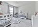 Bright Bedroom with grey carpet, white furniture, and a window with lots of natural light at 520 Pemberton St, Euharlee, GA 30145