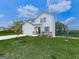 Lovely two-story home with white siding, two-car garage, and well-maintained front yard at 520 Pemberton St, Euharlee, GA 30145